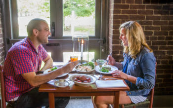 couple-dining-trustees-table